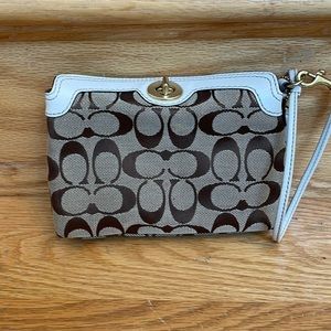 Genuine Coach wristlet, neutral logo fabric with cream leather trim